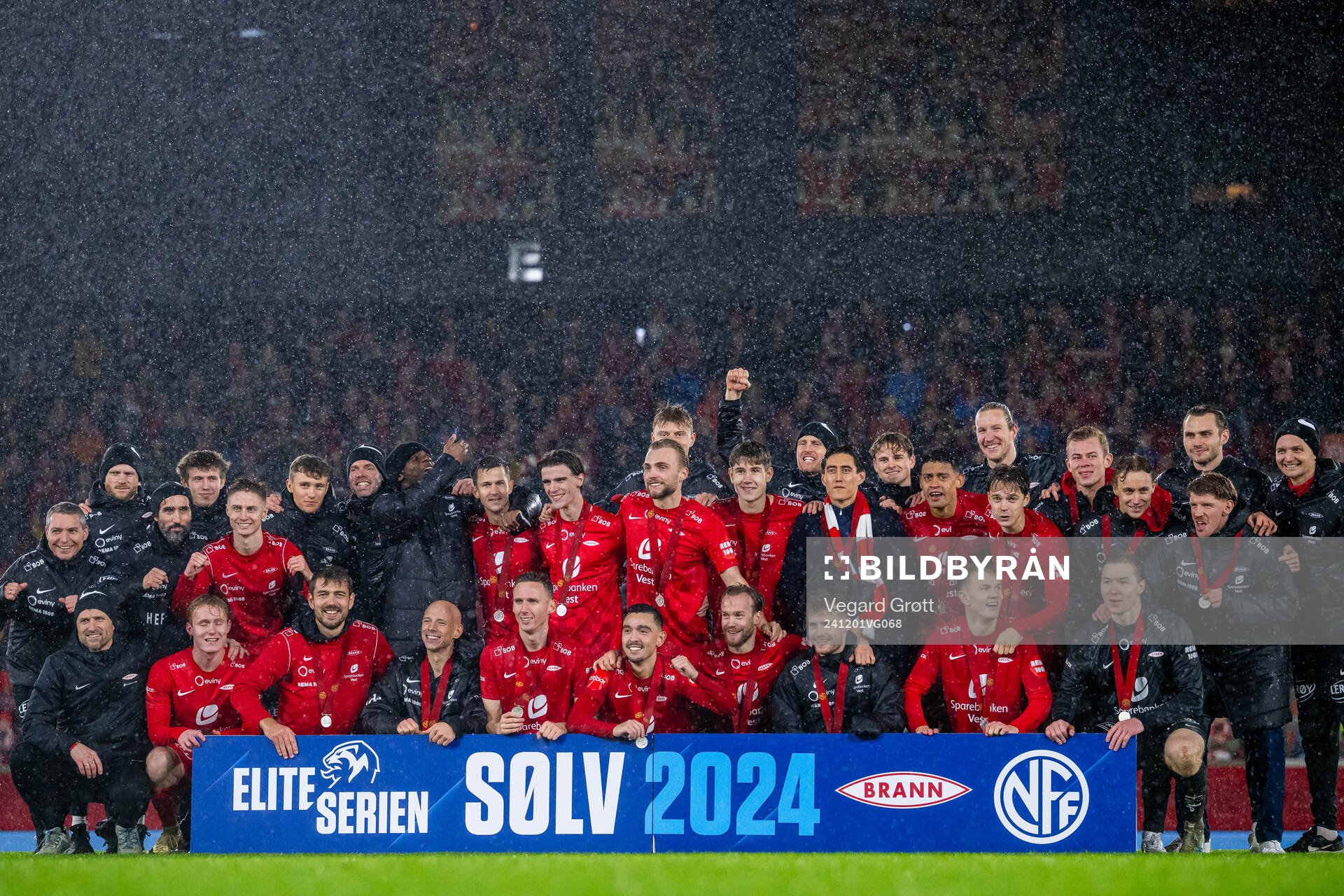 Players and staff of Brann celebrate