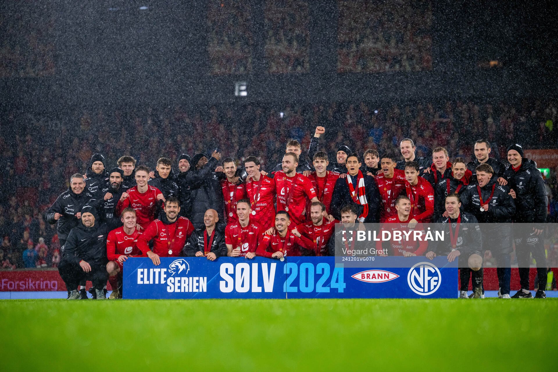Players and staff of Brann celebrate