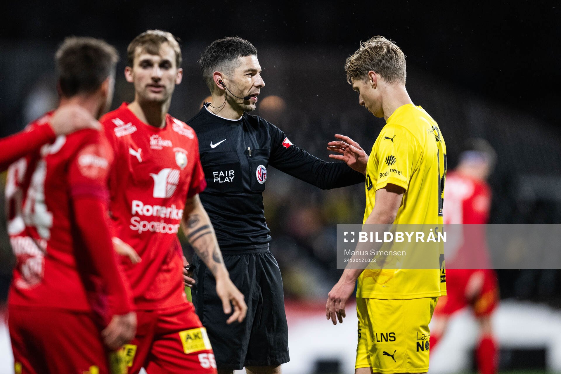 Referee Tore Hansen and Odin Bjørtuft of Bodø/Glimt