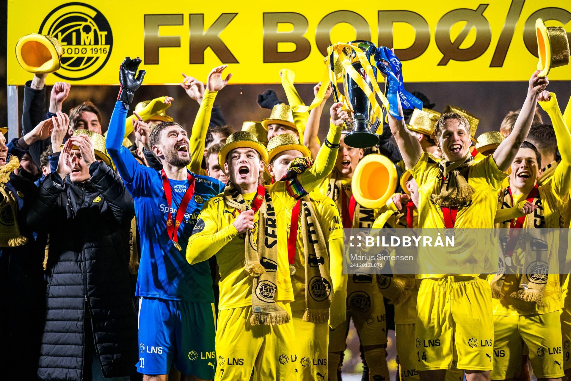 Nikita Haikin, Patrick Berg, Ulrik Saltnes and Sondre Brunstad Fet of Bodø/Glimt celebrates with the trophy after the Eliteserien match between Bodø/Glimt and Lillestrøm on December 1, 2024 in Bodø.