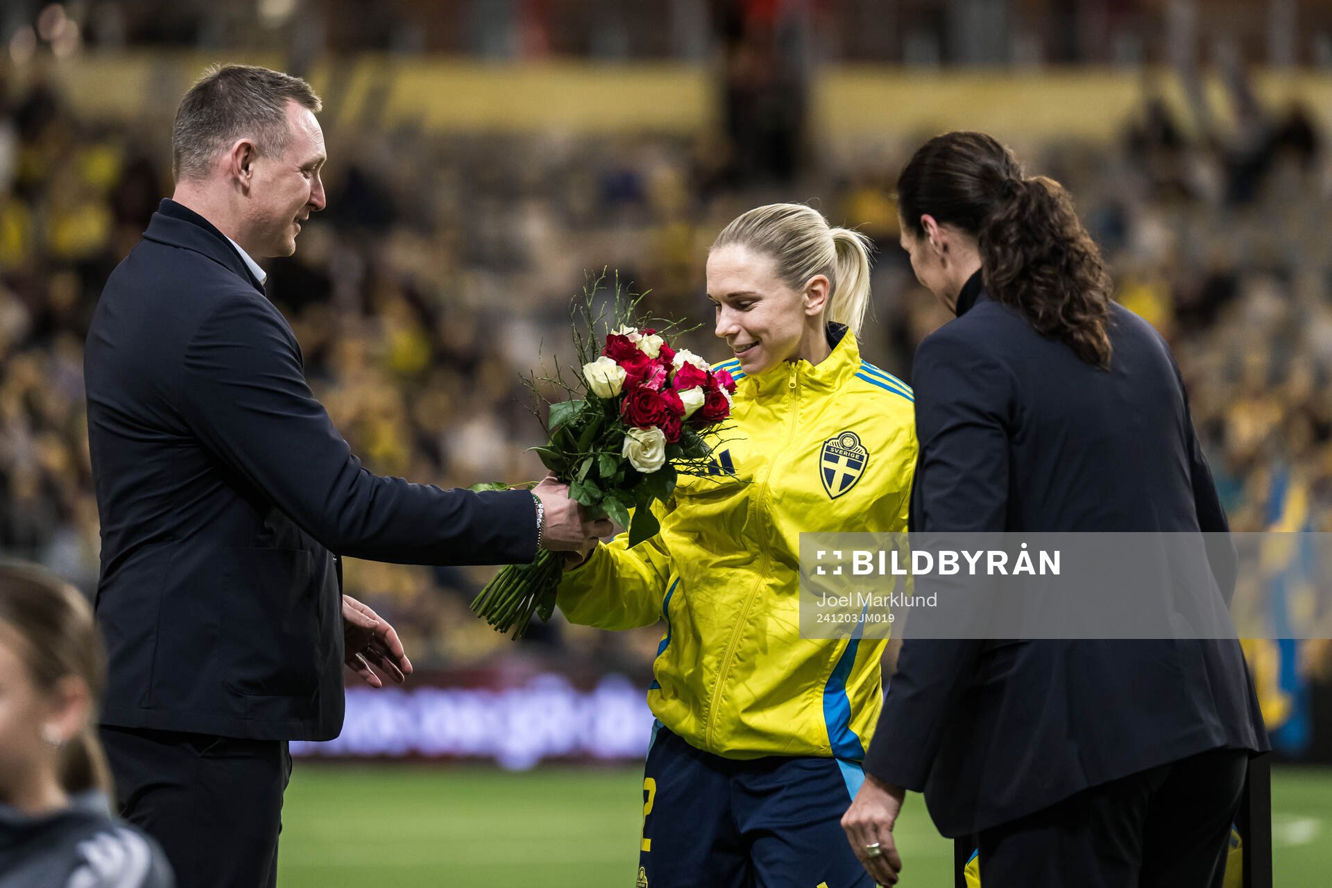 Jonna Andersson of Sweden is celebrated for 100 games with