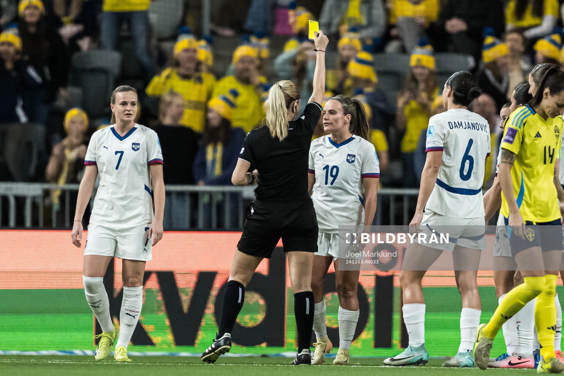 Referee Eleni Antoniou and Tyla Jay Vlajnic of Serbia