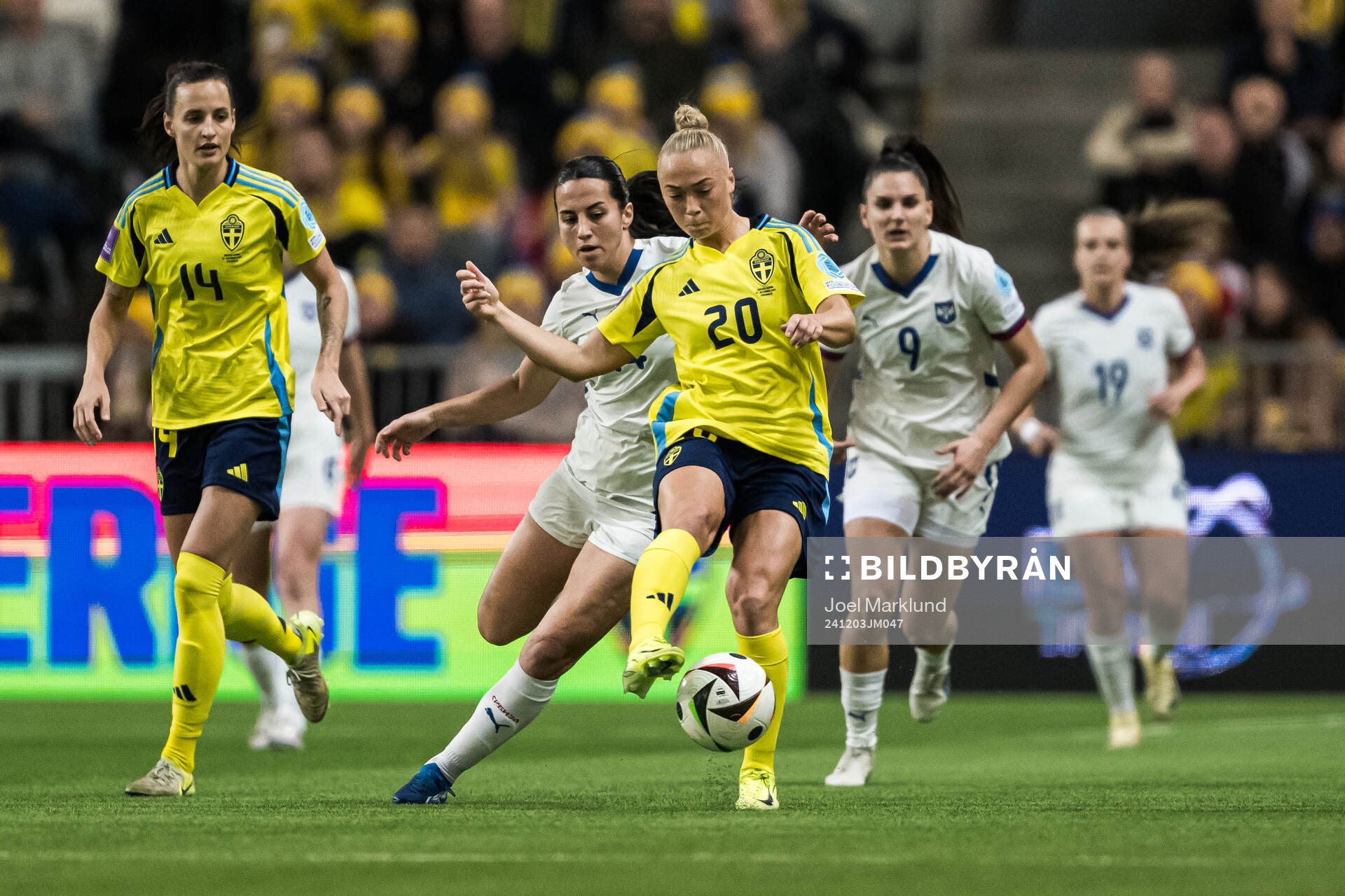 Nathalie Björn and Hanna Bennison of Sweden and Vesna Milivojevic of Serbia during the UEFA Women's Euro Qualifier play-off football match between Sweden and Serbia on December 3, 2024 in Stockholm.