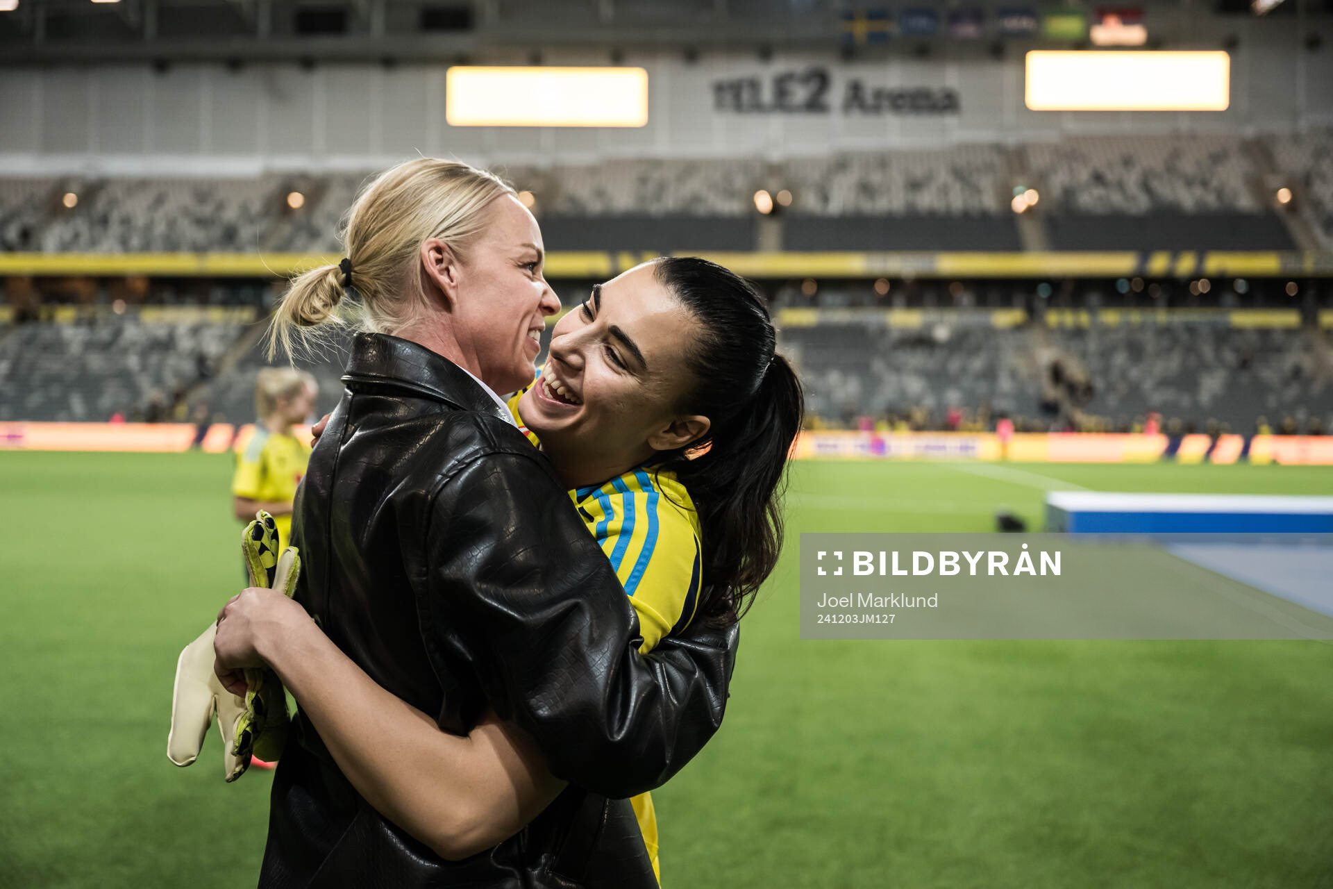 Caroline Seger and goalkeeper Zecira Musovic of Sweden