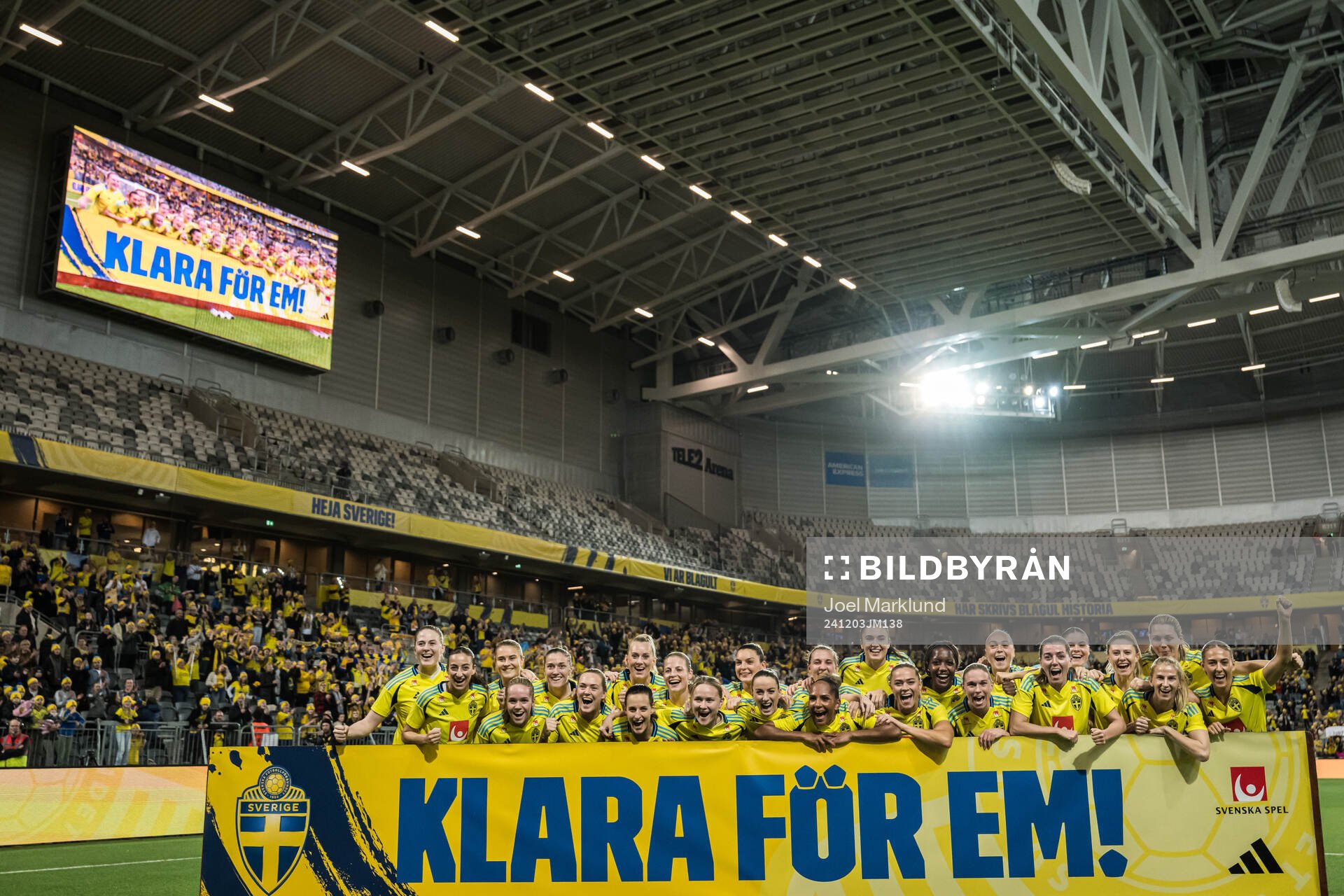 Players of Sweden celebrate with a sign ”Klara för EM!” after the UEFA Women's Euro Qualifier play-off football match between Sweden and Serbia on December 3, 2024 in Stockholm.