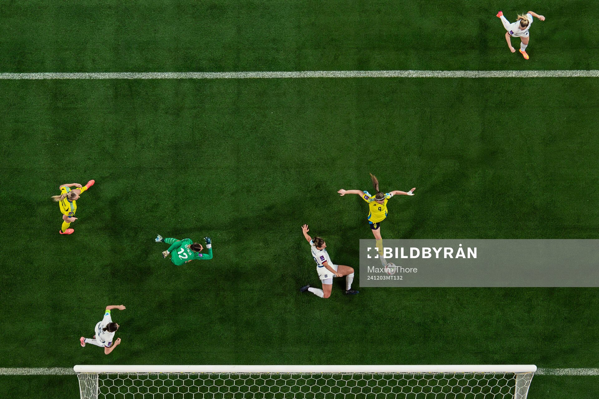 Kosovare Asllani of Sweden scores the 2-0 goal behind