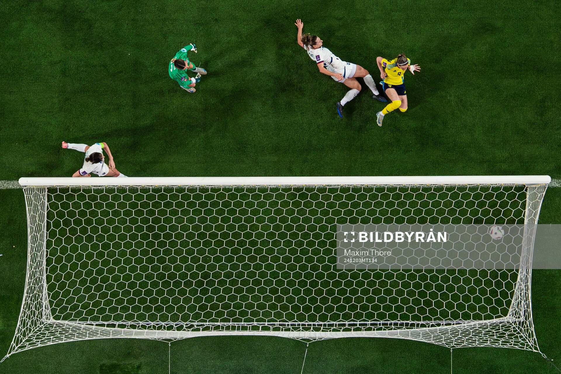 Kosovare Asllani of Sweden scores the 2-0 goal behind