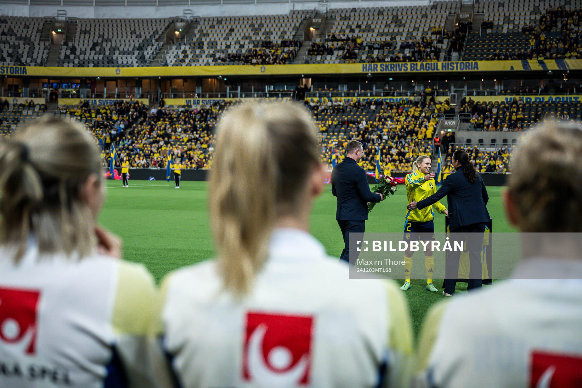 Jonna Andersson of Sweden is celebrated for 100 games with