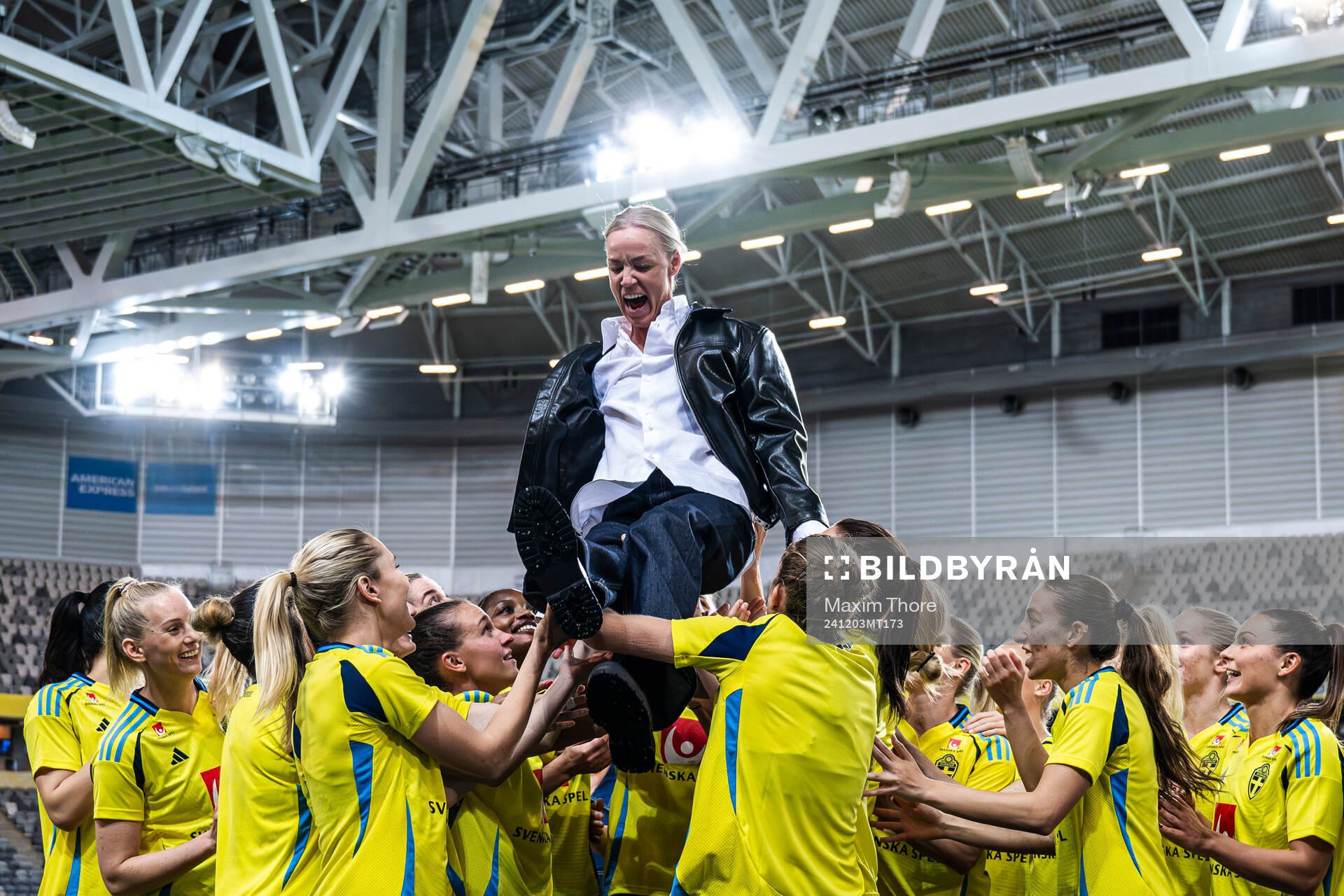 Caroline Seger is lifted by former teammates during a ceremony to honor her career after the UEFA Women's Euro Qualifier play-off football match between Sweden and Serbia on December 3, 2024 in Stockholm.