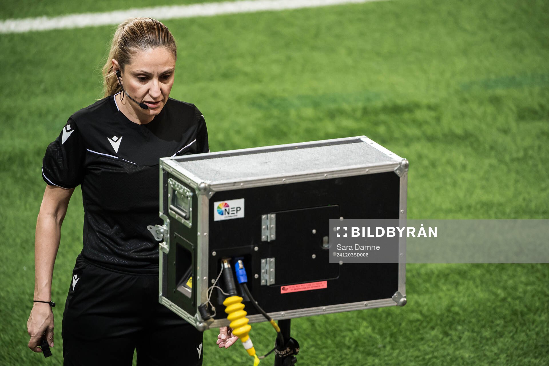 Referee Eleni Antoniou at a VAR situation