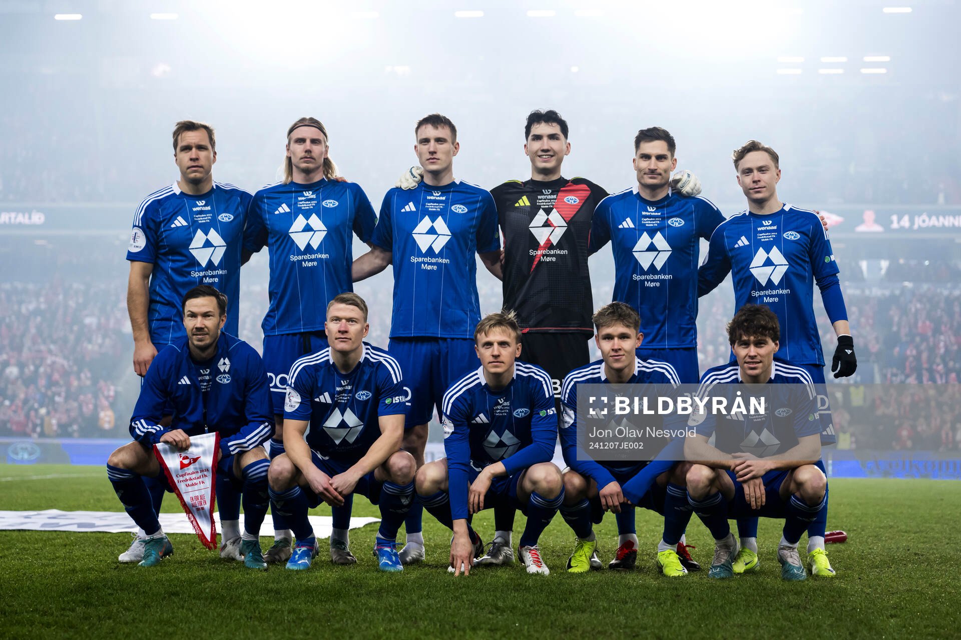 The starting eleven of Molde pose for a team group photo