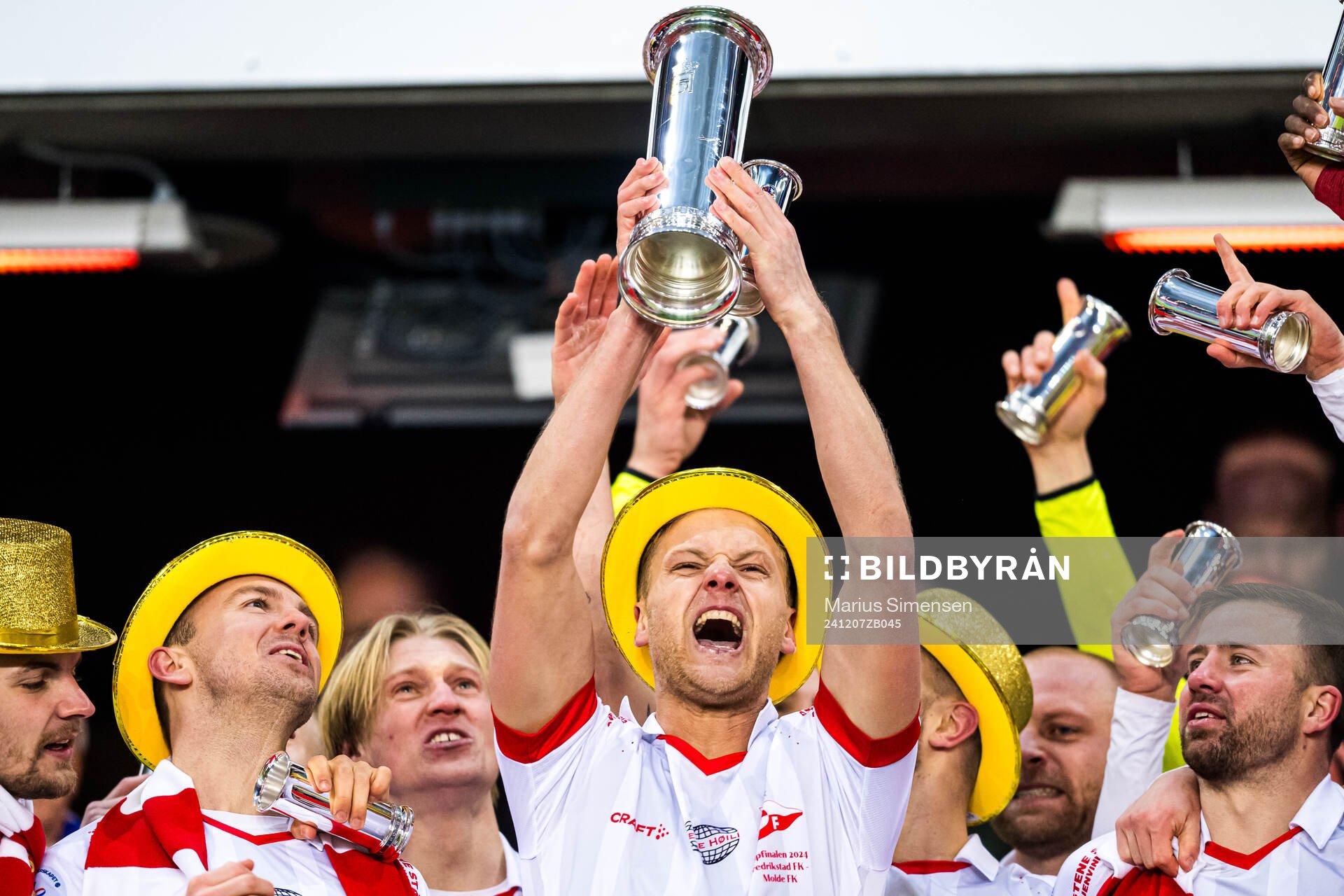 Morten Bjørlo of Fredrikstad celebrates with the trophy