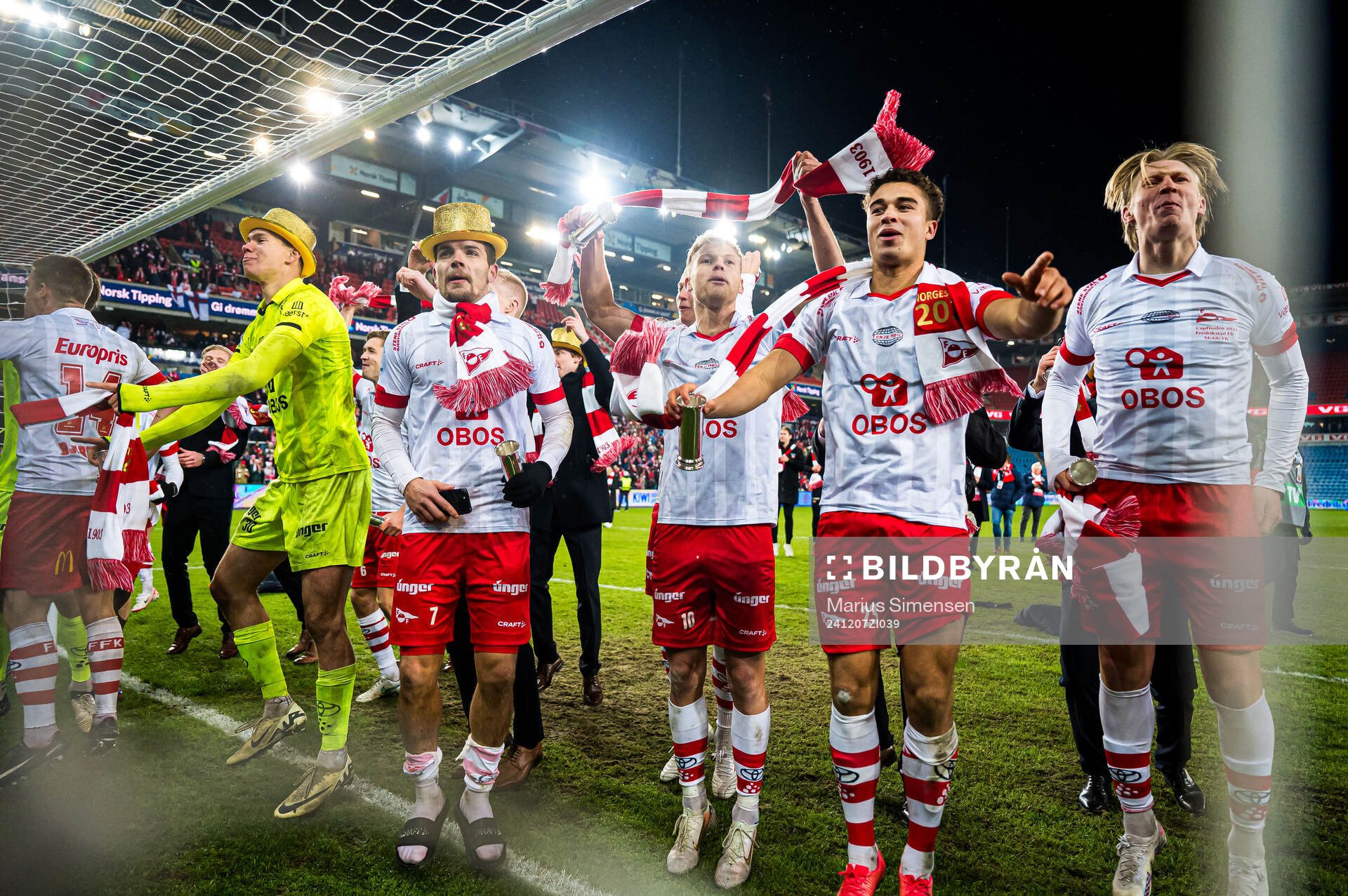 Jonathan Frost Fischer, Maxwell Woledzi, Fallou Fall and Mai Traore of Fredrikstad celebrates with the trophy after the cup final match between Fredrikstad and Molde on December 7, 2024 in Oslo.
