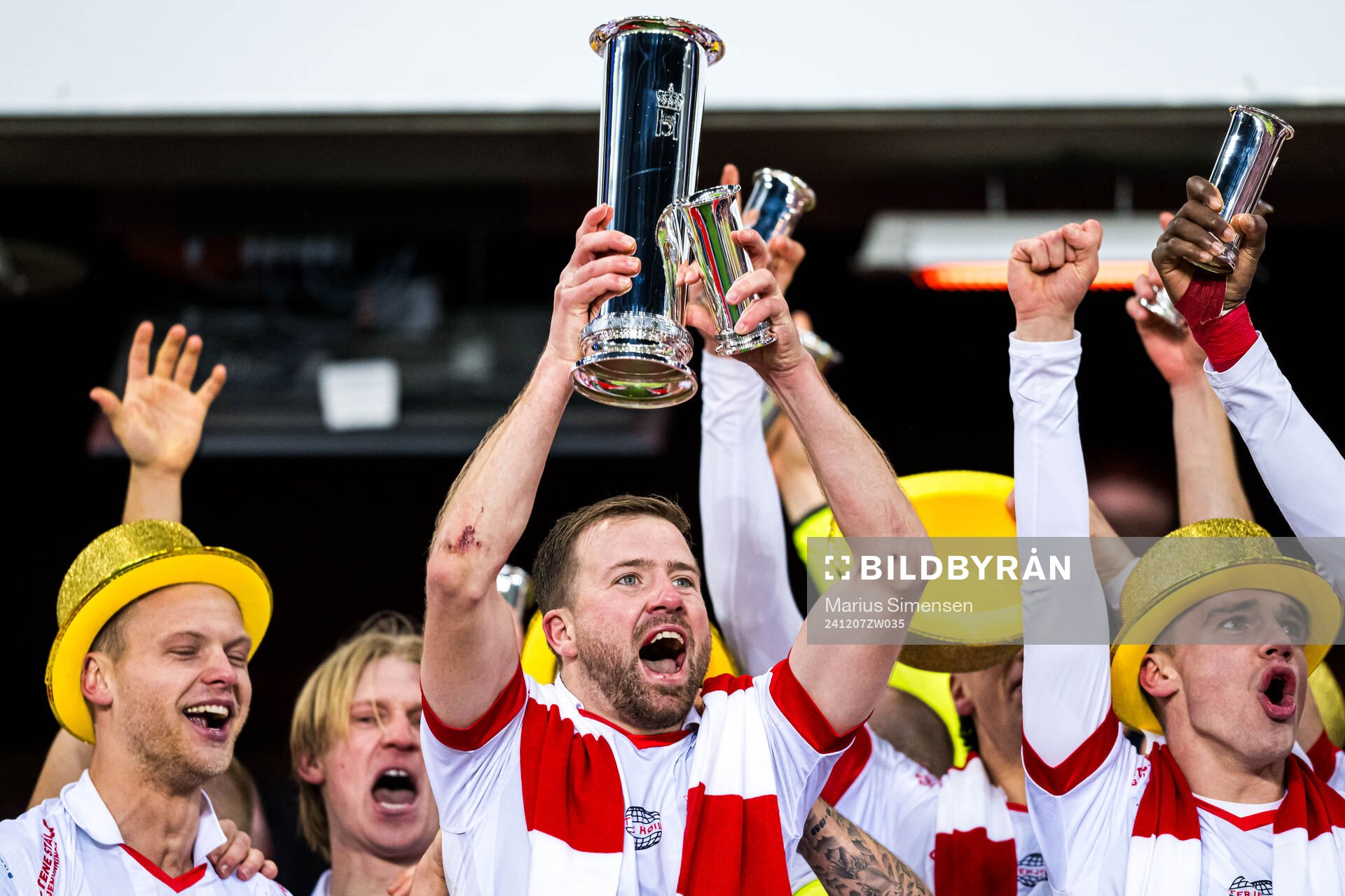 Simen Rafn of Fredrikstad celebrates with the trophy