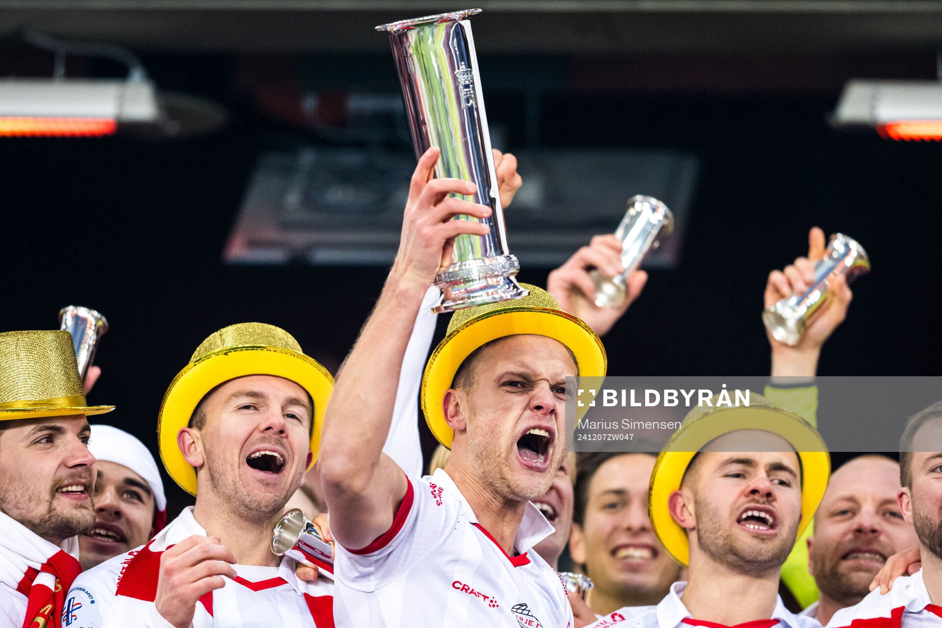 Morten Bjørlo of Fredrikstad celebrates with the trophy