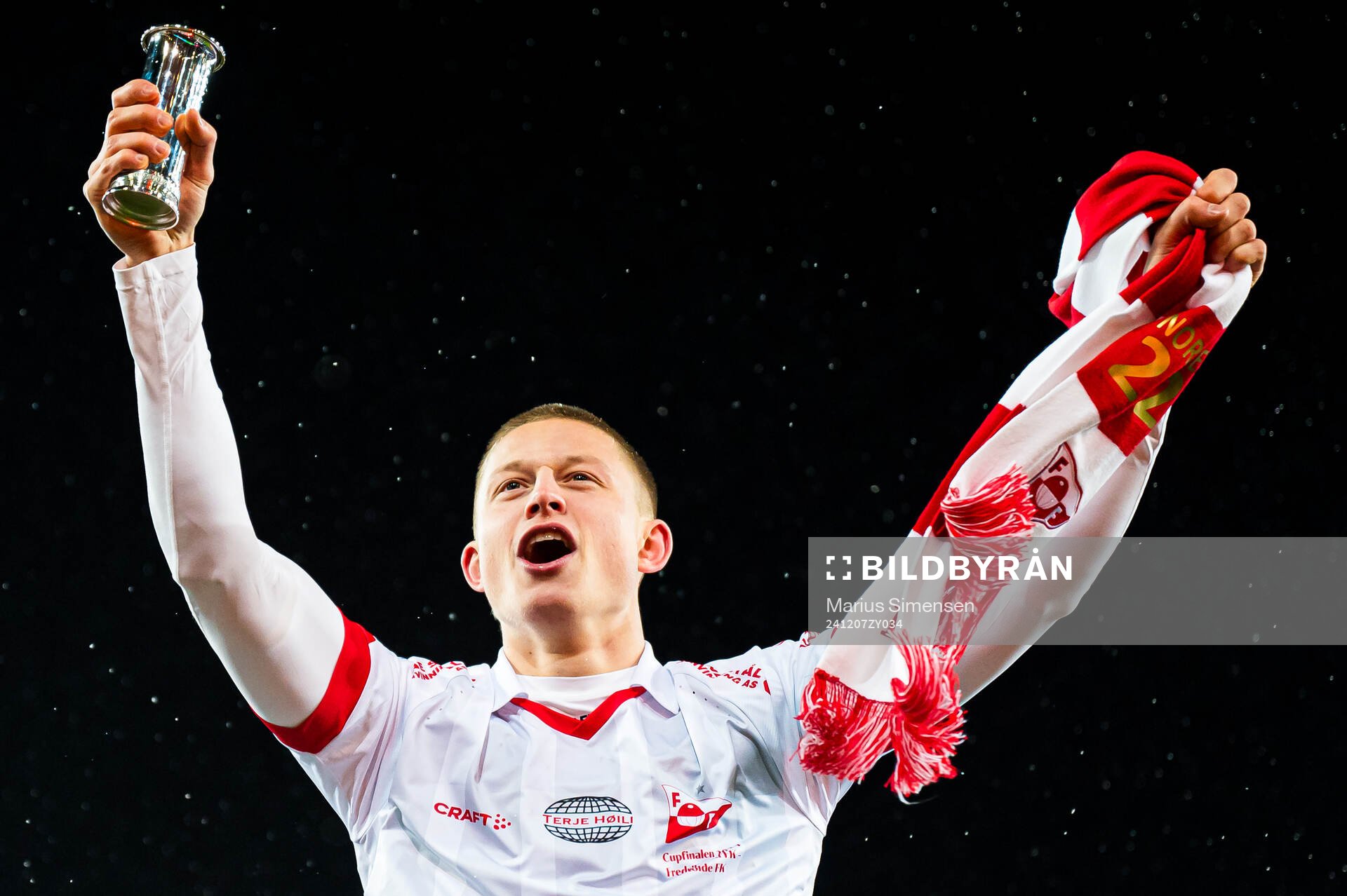 Brage Skaret of Fredrikstad celebrates with the trophy