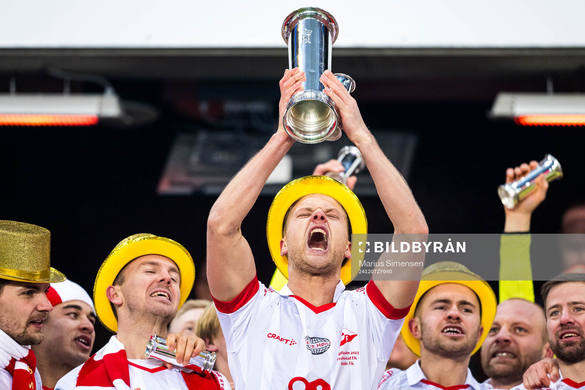 Morten Bjørlo of Fredrikstad celebrates with the trophy