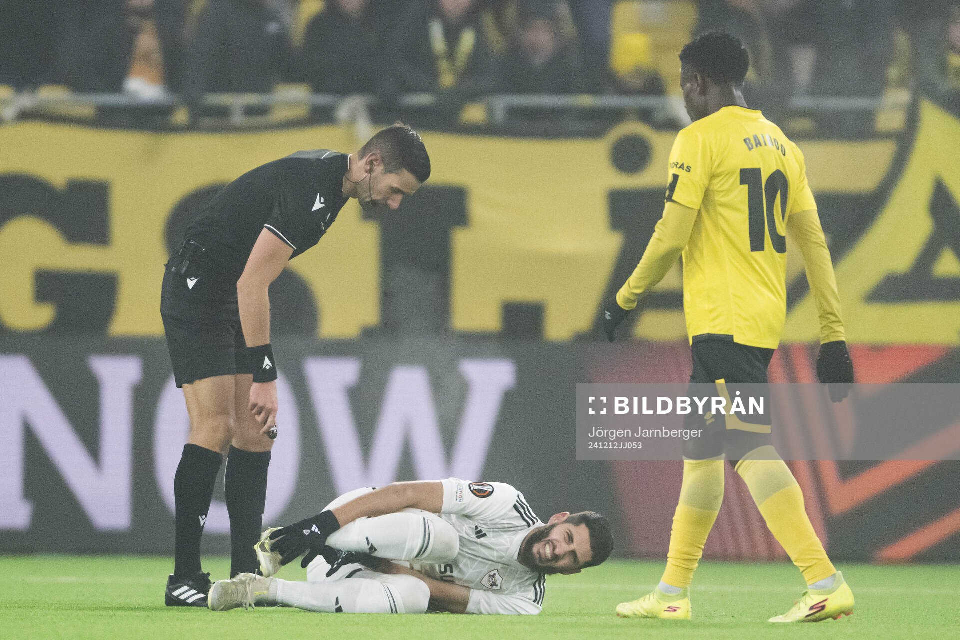 Referee Antonio Nobre checks