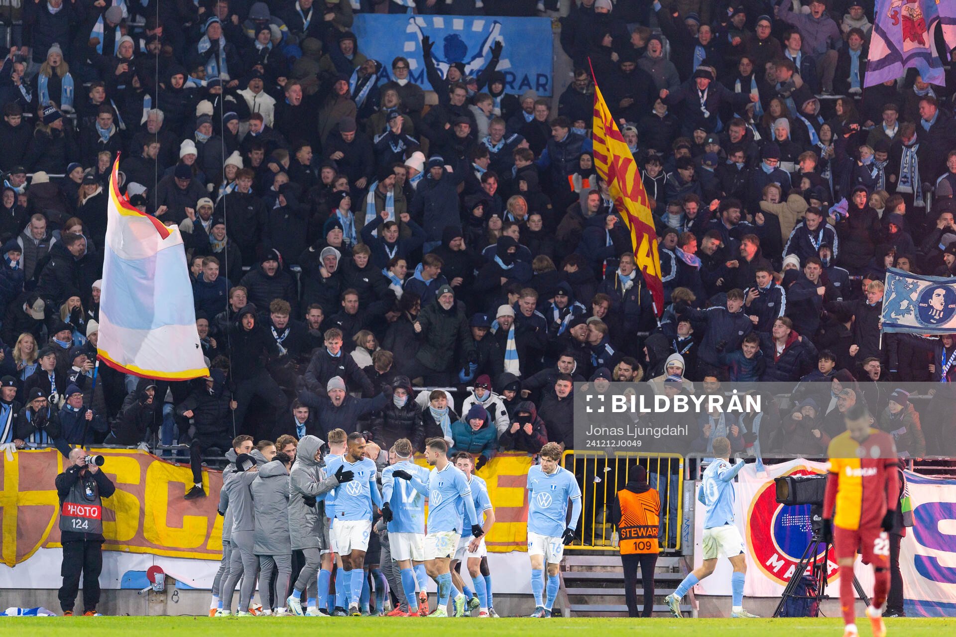 Players of Malmö FF celebrates infant of fans