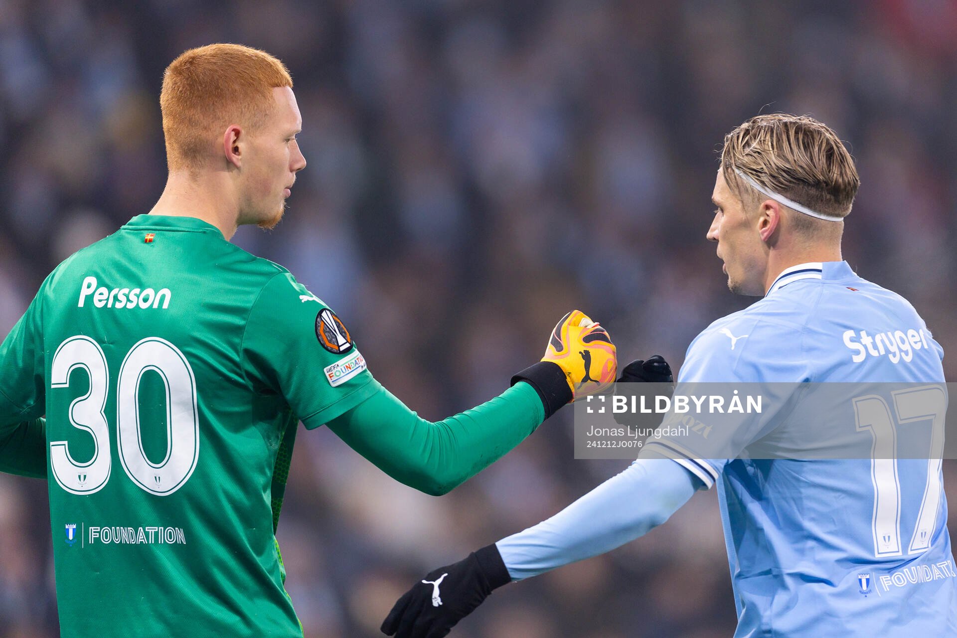 goalkeeper Joakim Persson and Jens Stryger Larsen of Malmö