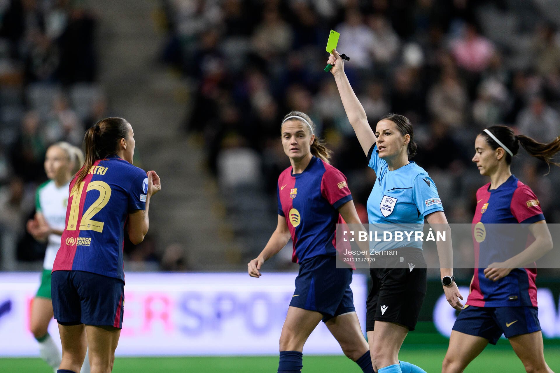 Patri Guijarro of Barcelona receives a yellow card from