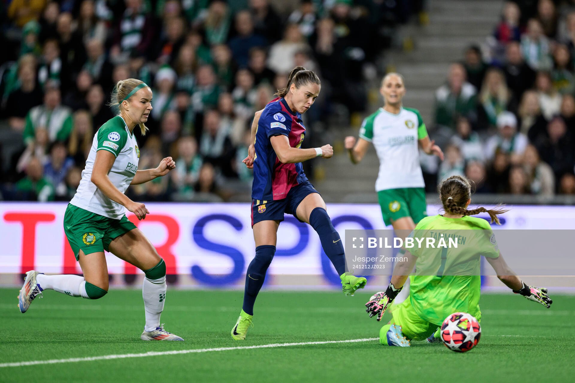 Ewa Pajor of Barcelona scores 0-1 behind goalkeeper Anna