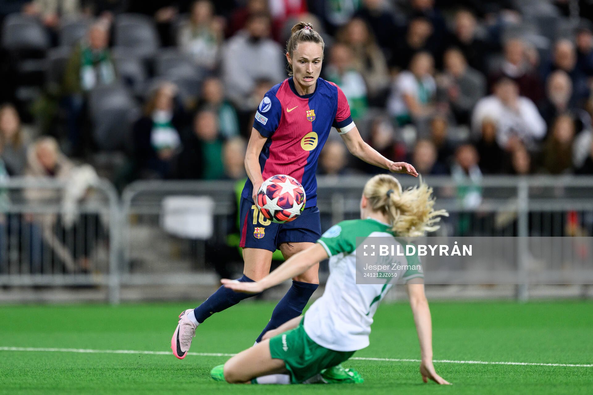 Caroline Graham Hansen of Barcelona and Emilie Joramo of Hammarby during the UEFA Women's Champions League football match between Hammarby and Barcelona on December 12, 2024 in Stockholm.