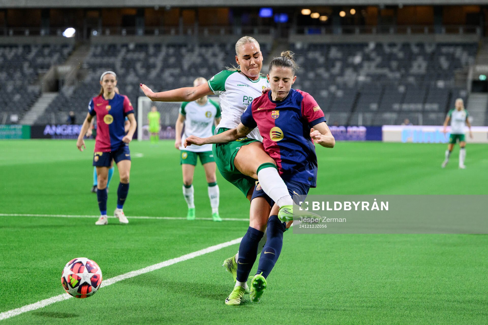 Cathinka Tandberg of Hammarby and Ona Batlle of Barcelona during the UEFA Women's Champions League football match between Hammarby and Barcelona on December 12, 2024 in Stockholm.