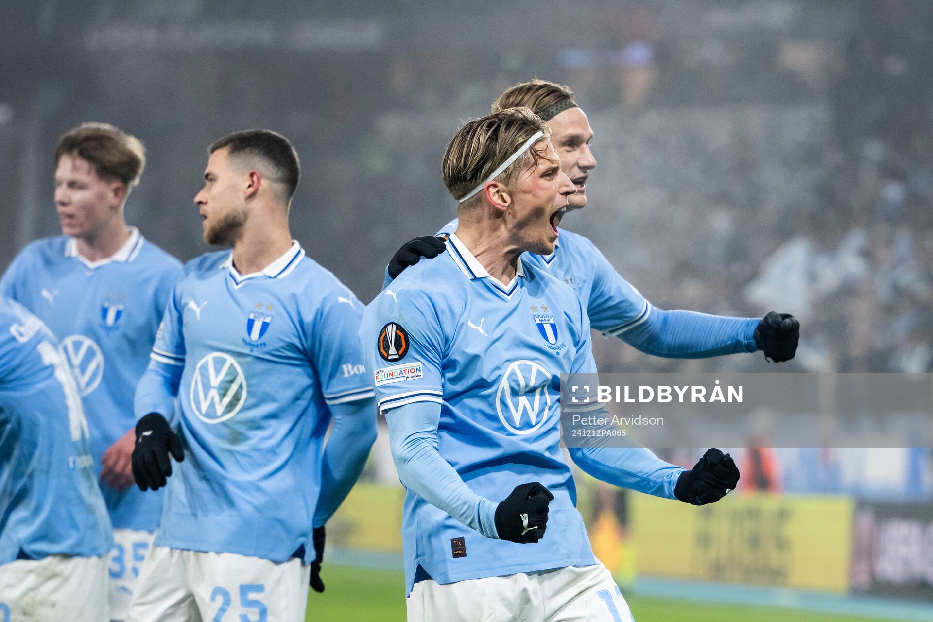 Jens Stryger Larsen and Erik Botheim of Malmö FF celebrate