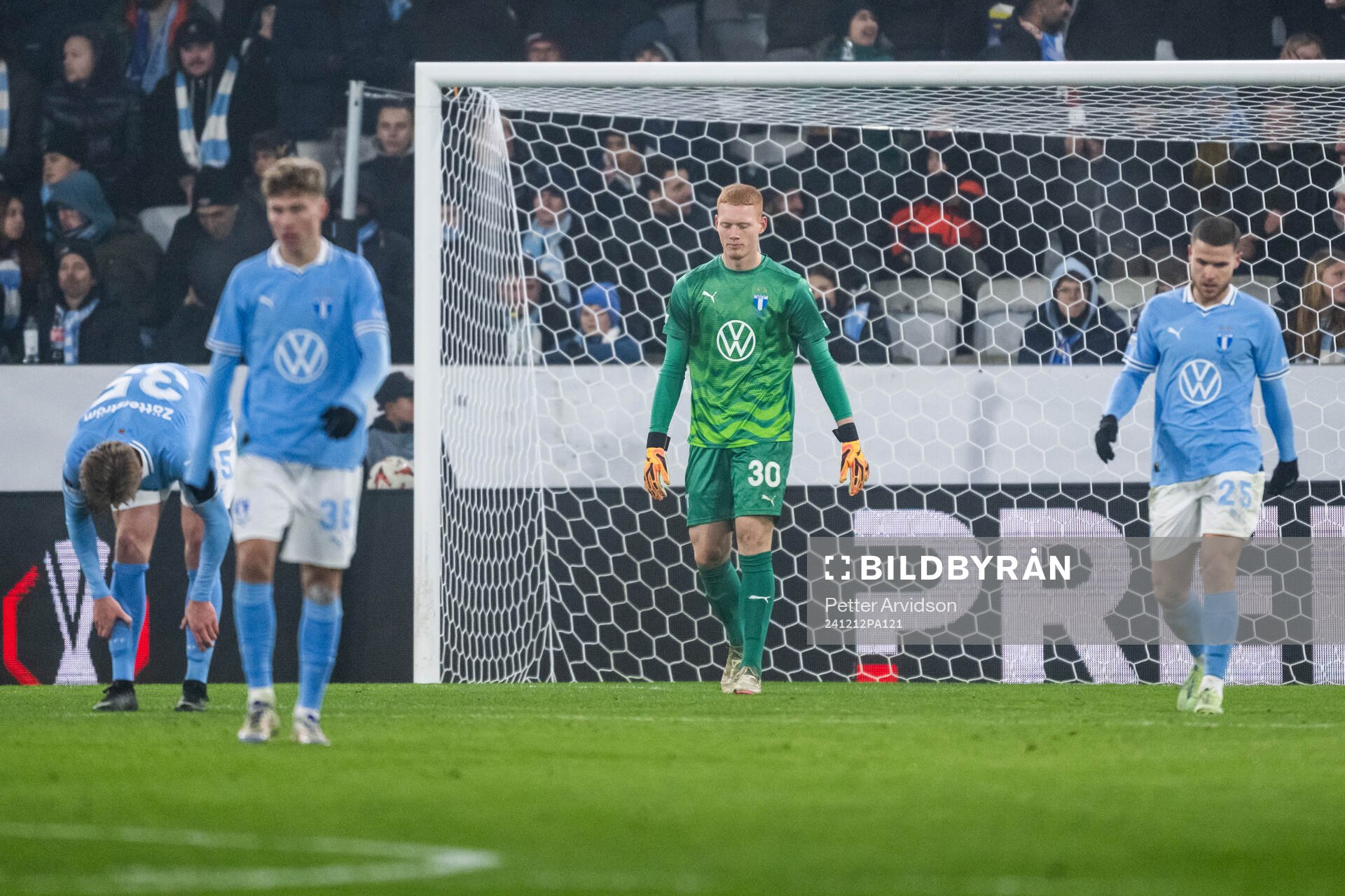 Goalkeeper Joakim Persson and Gabriel Busanello of Malmö