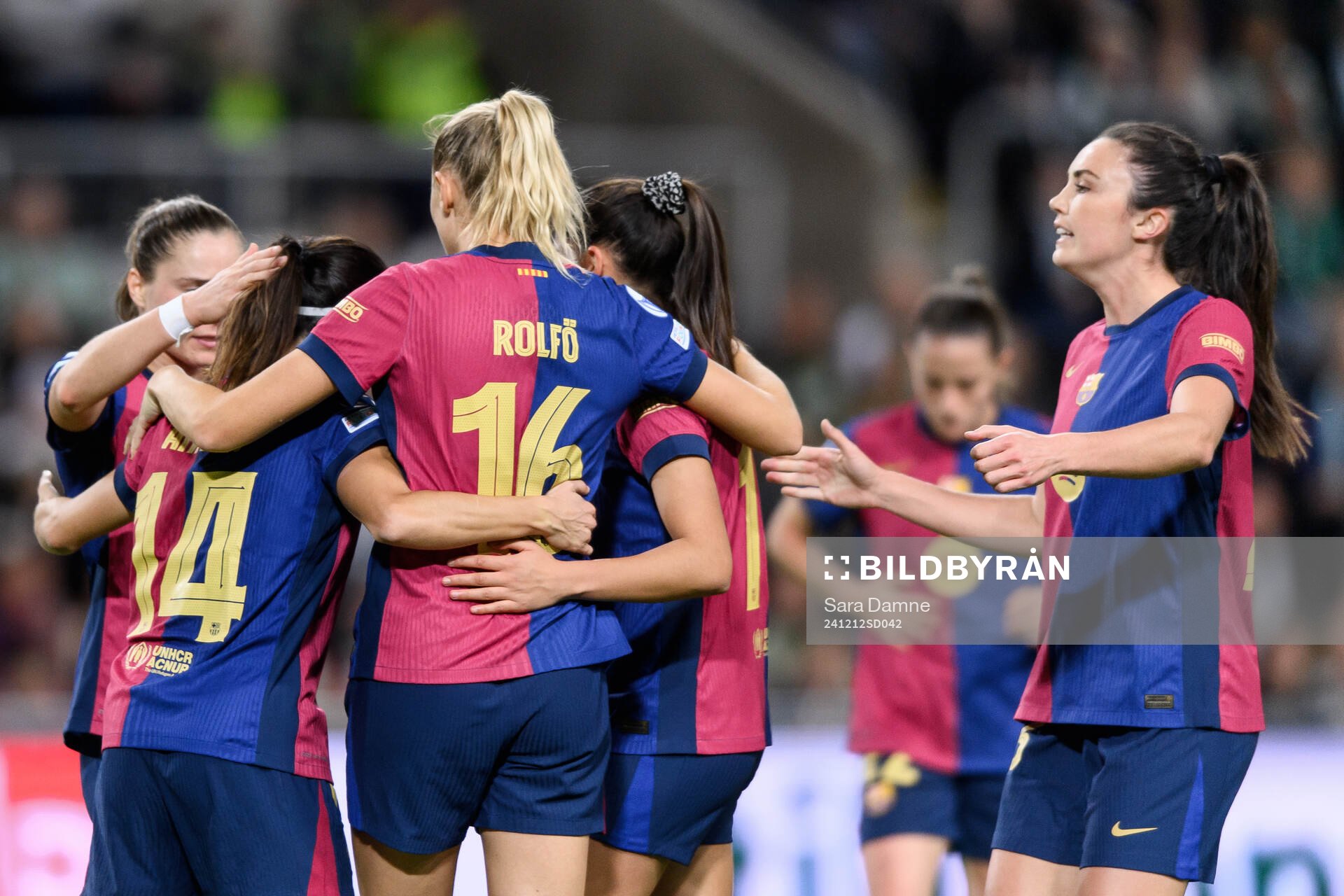Aitana Bonmati of Barcelona celebrates with Fridolina Rolfö and Ingrid Engen after scoring 0-3 during the UEFA Women's Champions League football match between Hammarby and Barcelona on December 12, 2024 in Stockholm.