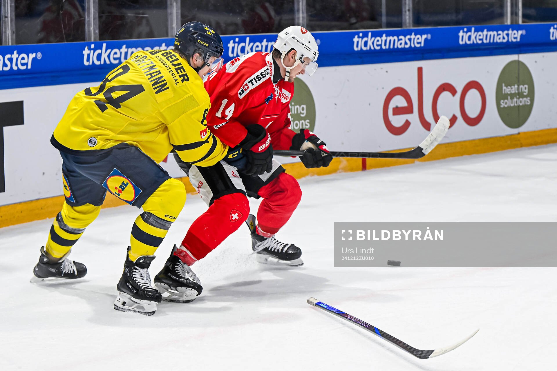 Sebastian Hartmann of Sweden and Dean Kukan of Switzerland
