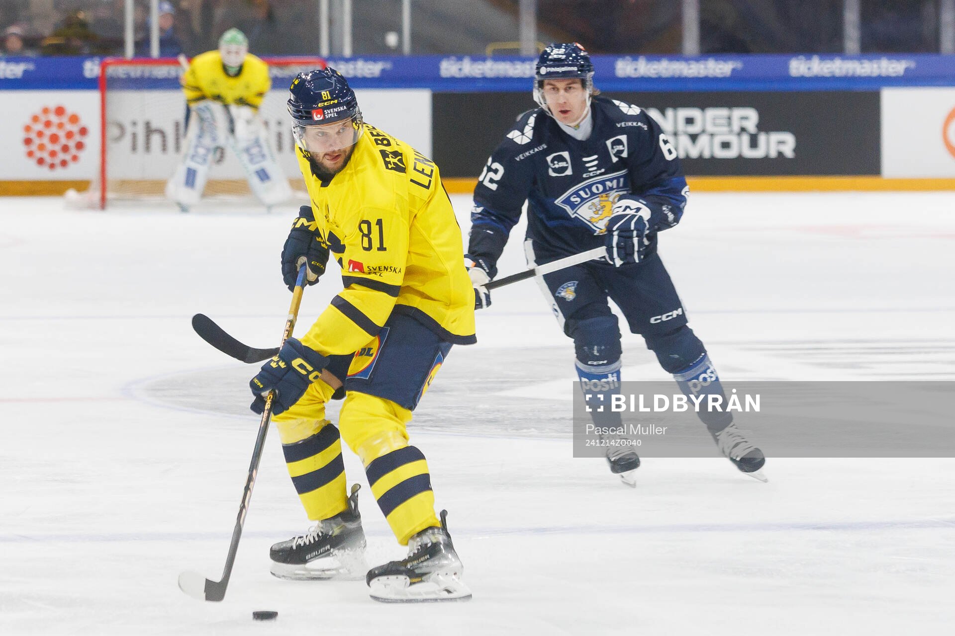 Theodor Lennström of Sweden in the ice hockey game between