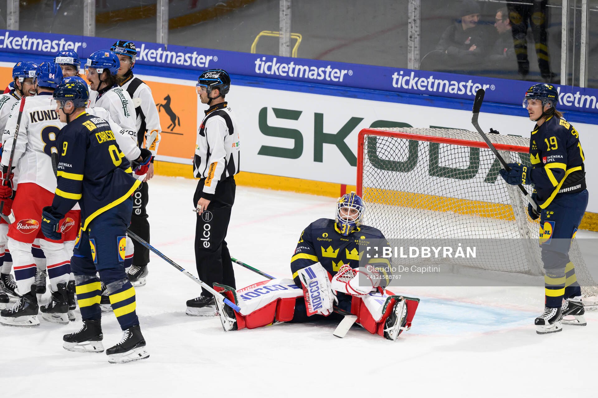 Goaltender Lars Johansson of Sweden looks dejected in the