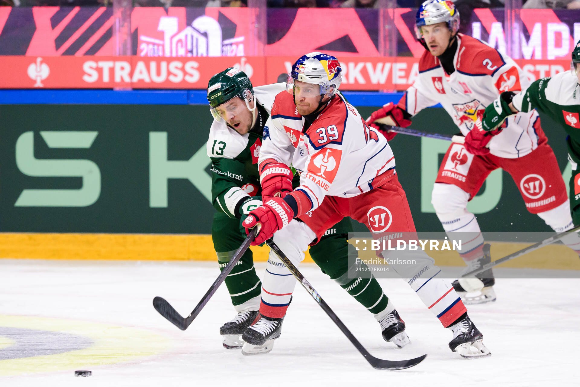 Joel Kellman of Färjestad  and Chay Genoway of EC Red Bull