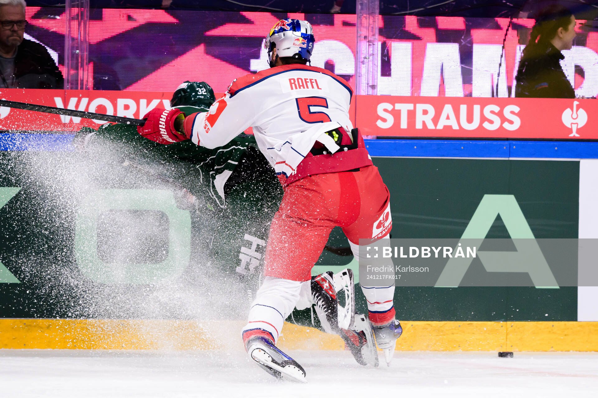 Magnus Nygren of Färjestad and Thomas Raffl of EC Red Bull