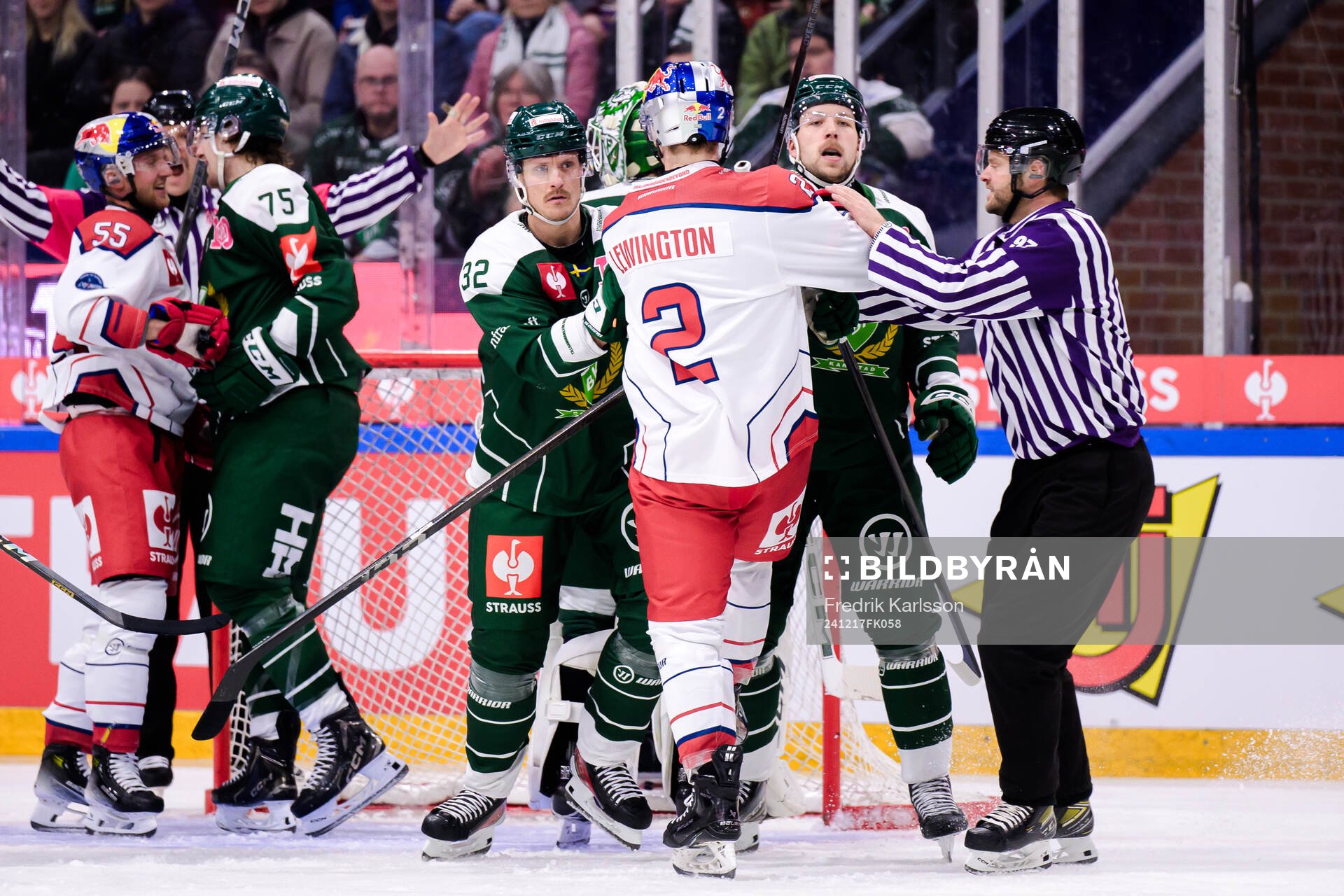 Magnus Nygren of Färjestad  and Tyler Lewington of EC Red
