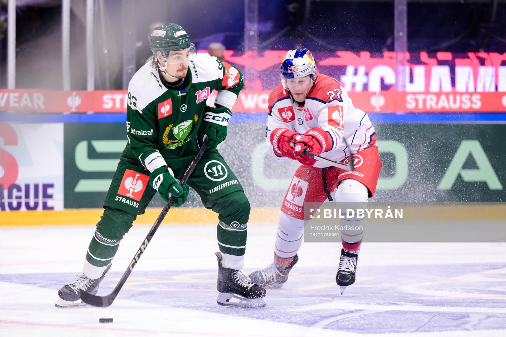 David Tomasek of Färjestad  and Dennis Robertson of EC Red