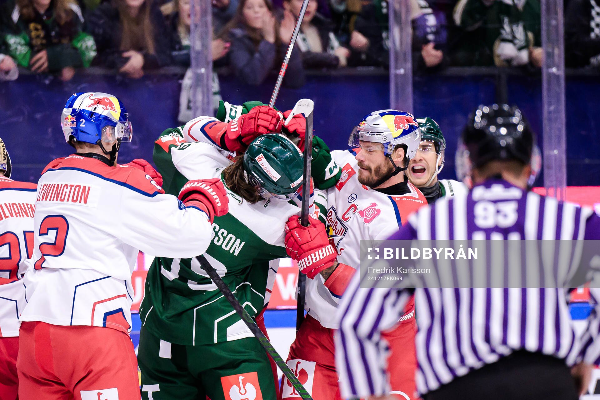 Linus Johansson of Färjestad  and Thomas Raffl of EC Red