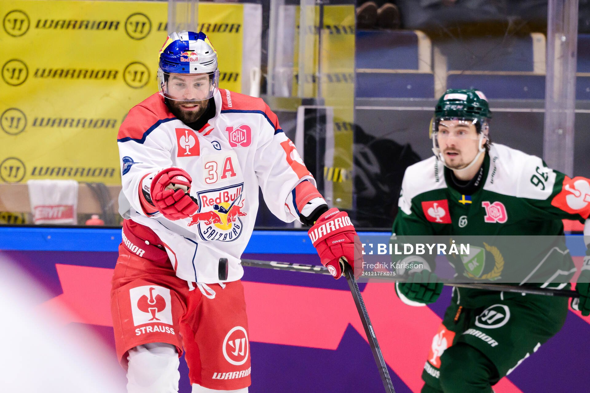Peter Schneider of EC Red Bull Salzburg and David Tomasek