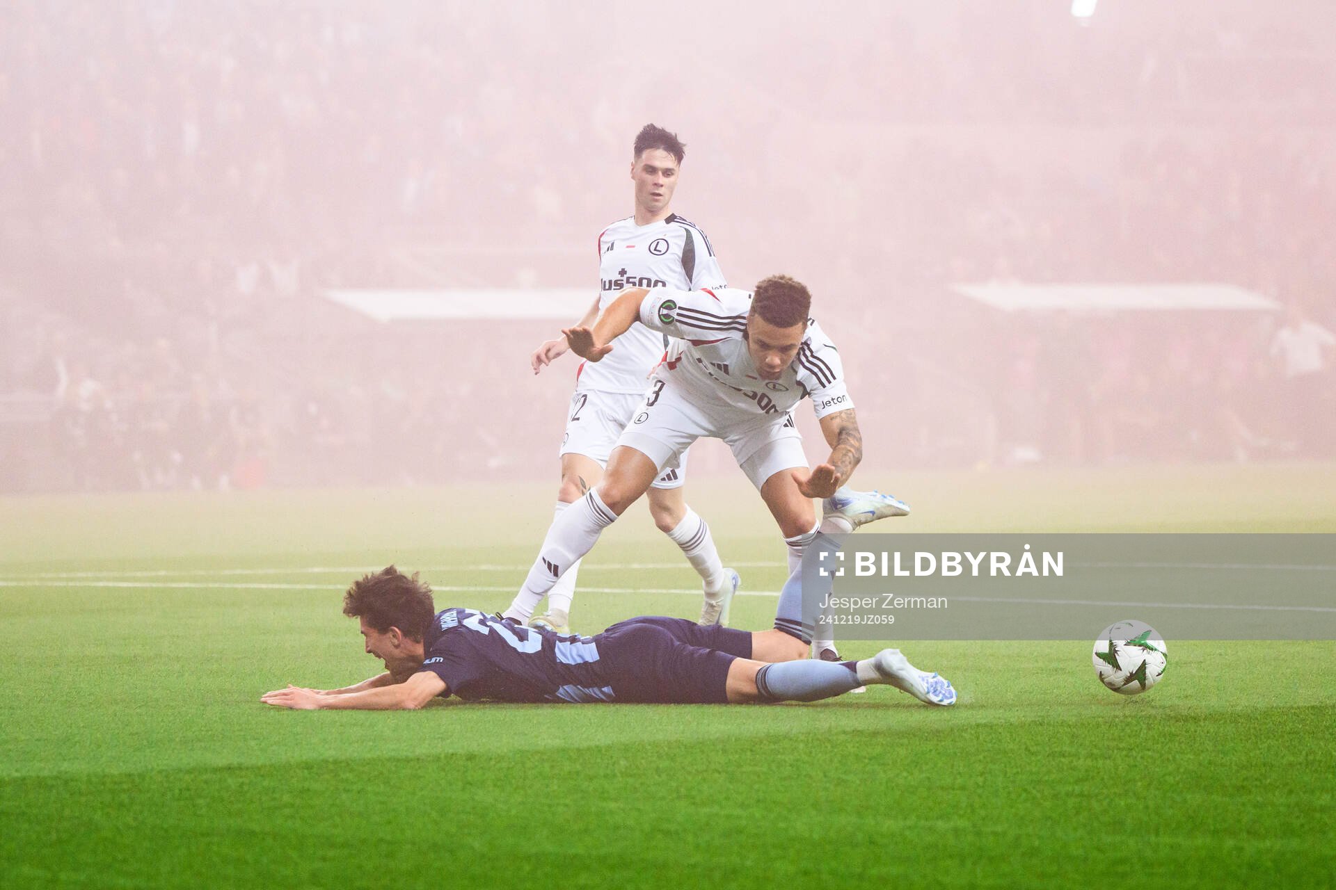 Gustav Wikheim of Djurgården and Steve Kapaudi of Legia Warszawa during the UEFA Conference League match between Djurgården and Legia Warszawa on December 19, 2024 in Stockholm. 