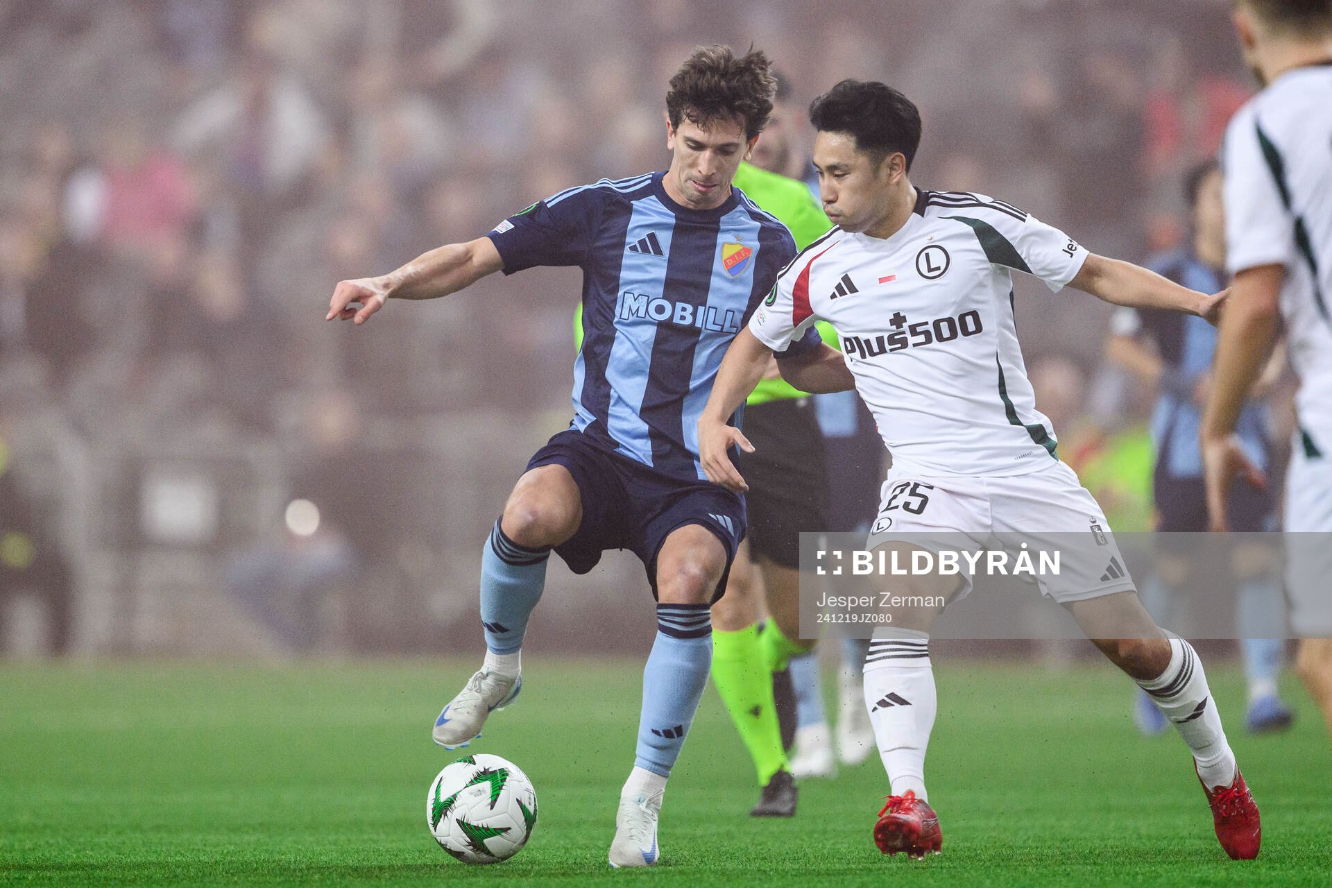 Gustav Wikheim of Djurgården and Ryoya Morishita of Legia Warszawa during the UEFA Conference League match between Djurgården and Legia Warszawa on December 19, 2024 in Stockholm. 