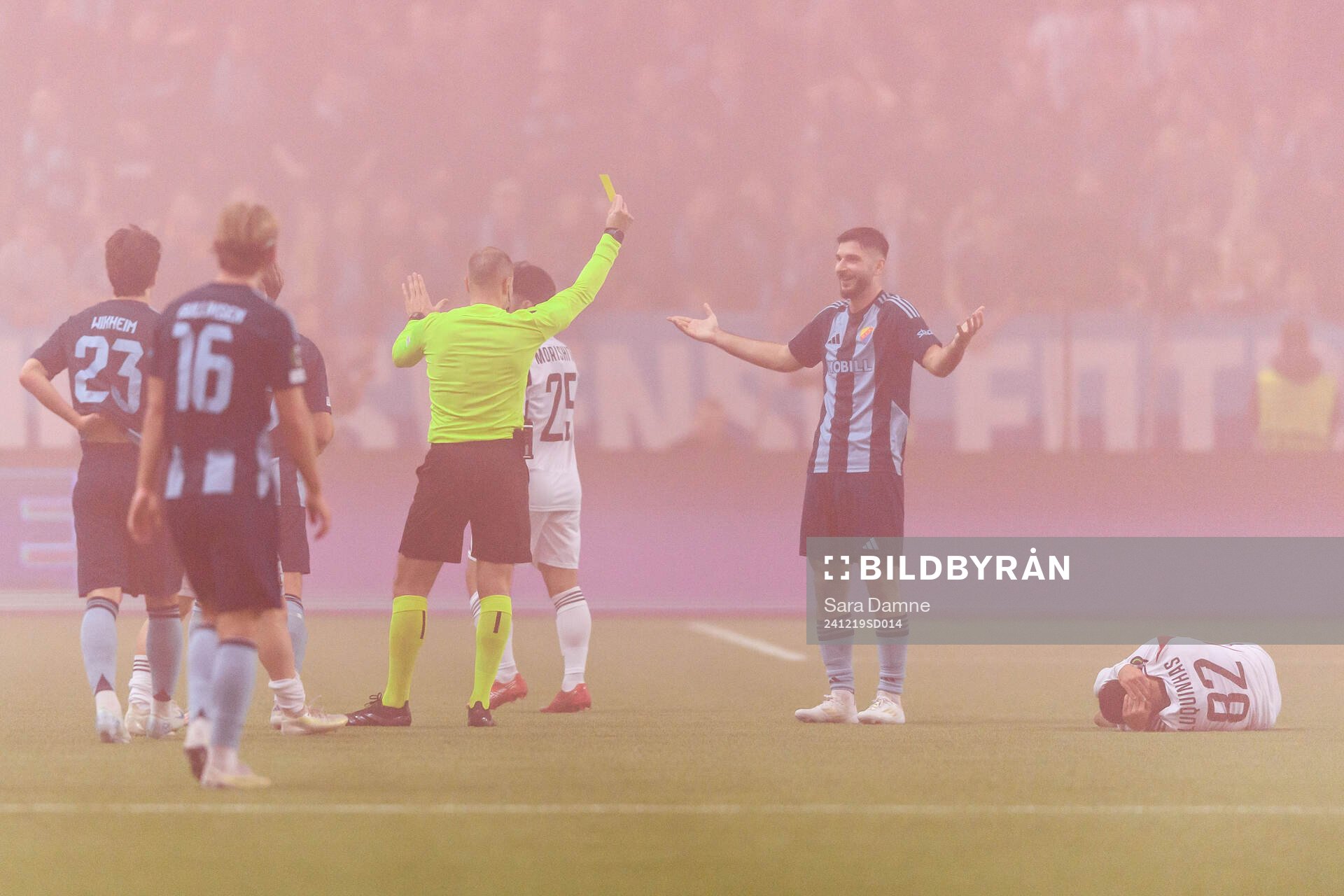 Besard Sabovic of Djurgården receives a yellow card