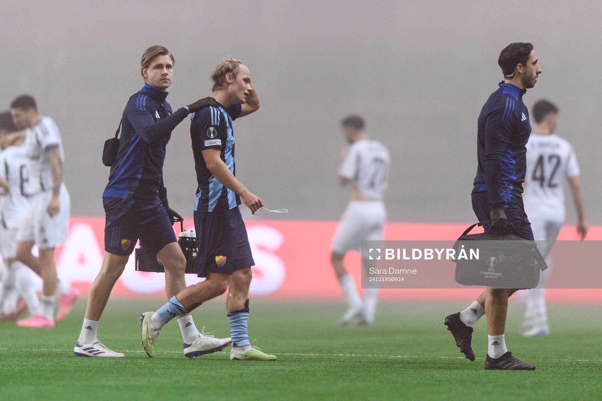 Tobias Gulliksen of Djurgården leaves the pitch injured