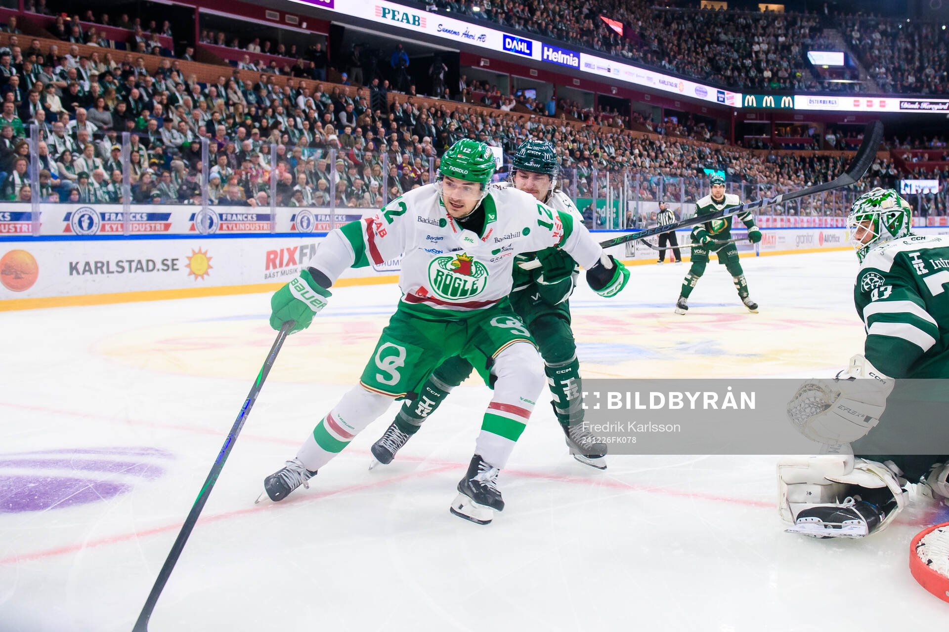 Rögles Brady Ferguson och Färjestads Jeremy Salvas Groleau