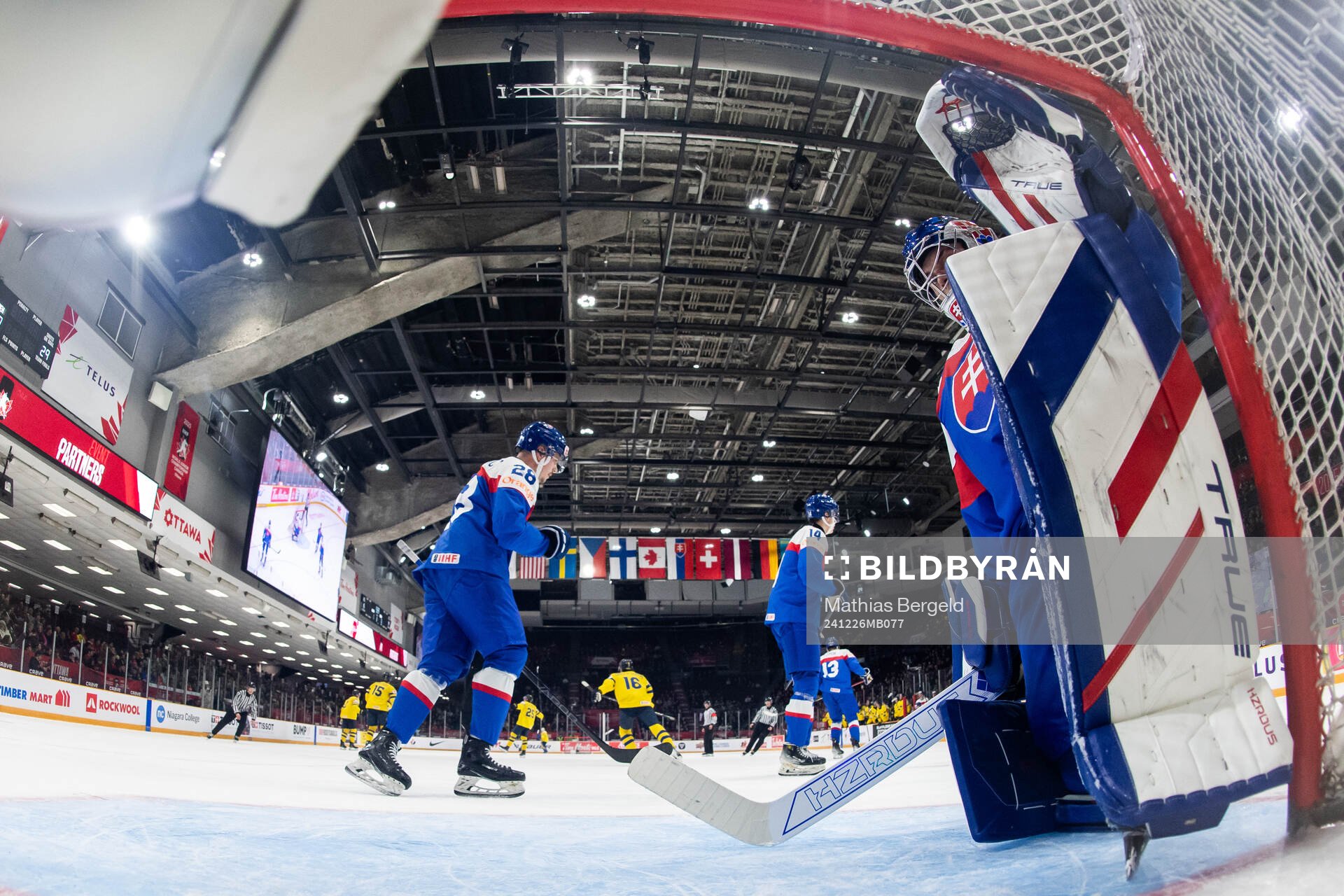 Goaltender Samuel Urban of Slovakia looks dejected