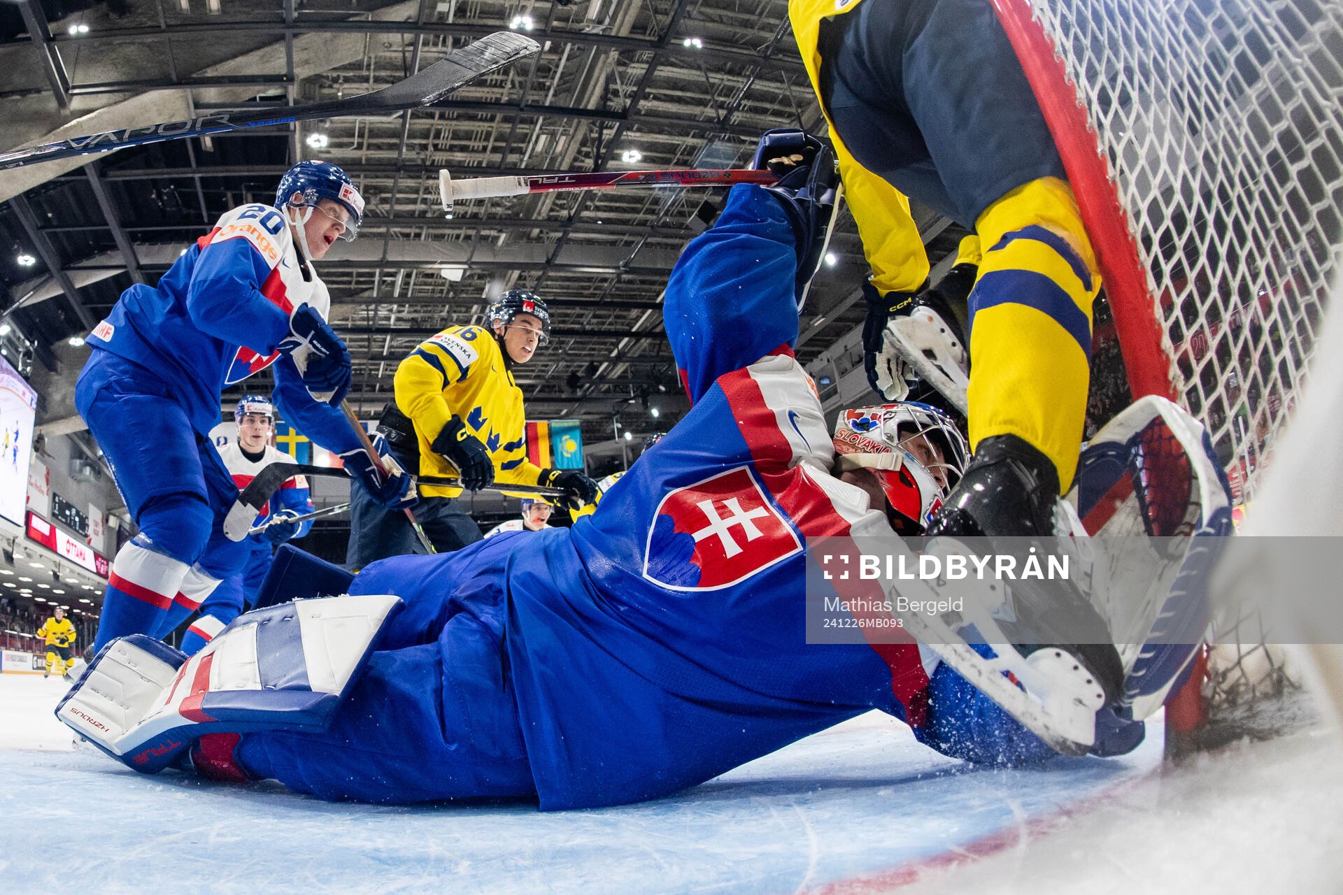 Peter Valent and goaltender Samuel Urban of Slovakia