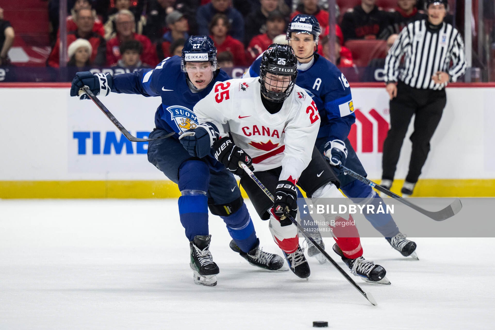 Julius Miettinen of Finland and Matthew Schaefer of Canada