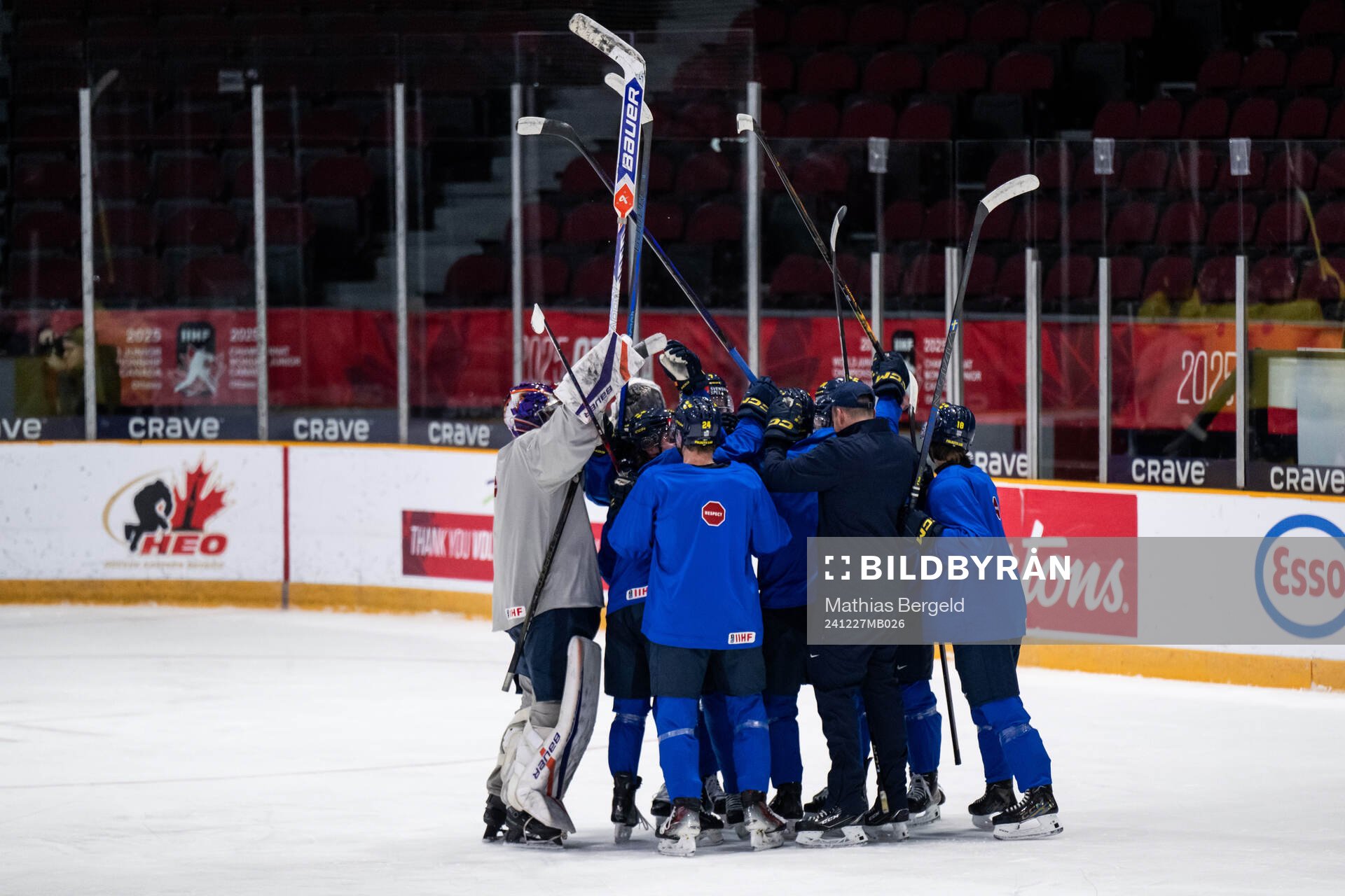 Players of Sweden celebrate at a practice session