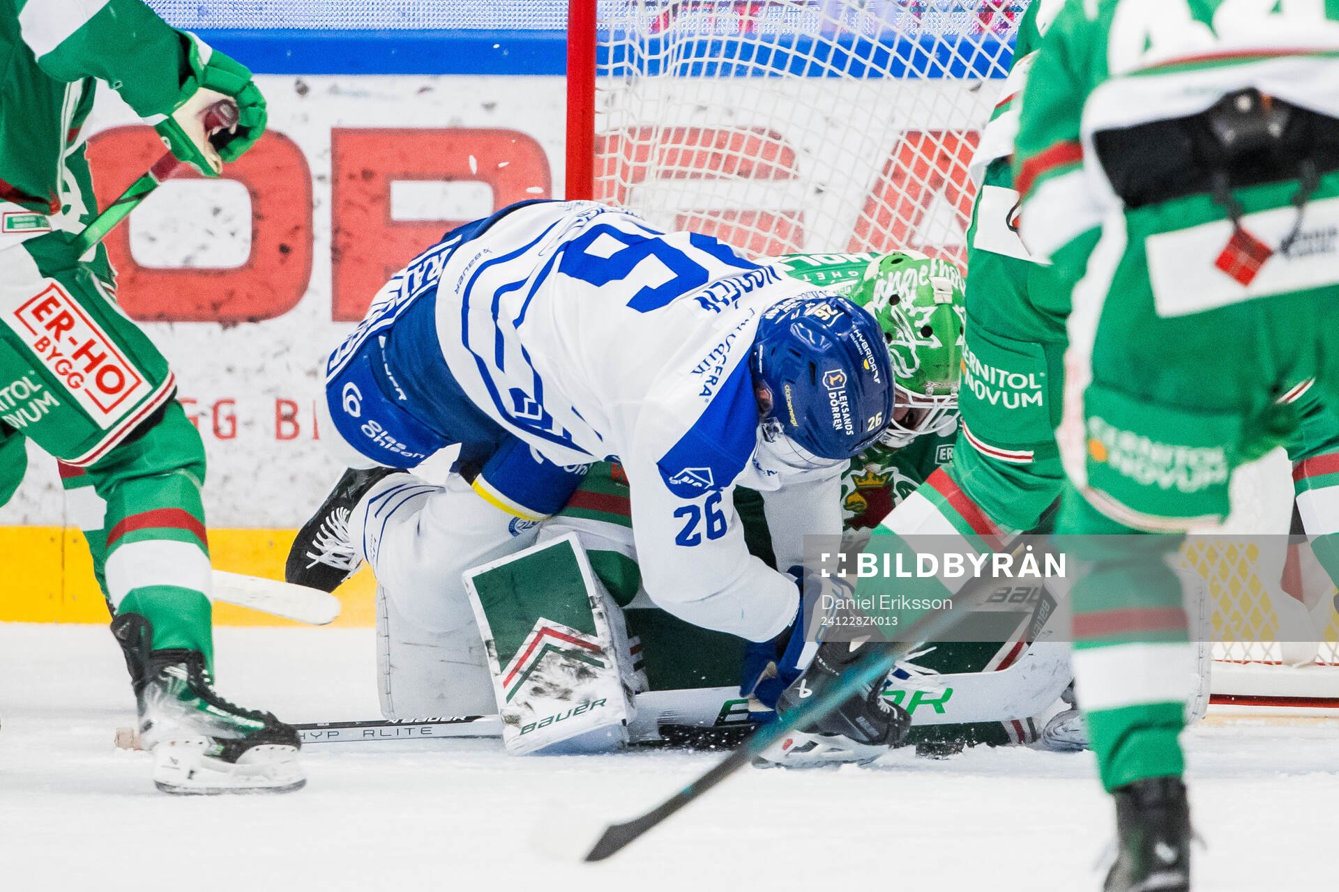 Leksands Patrik Norén och Rögles målvakt Arvid Holm